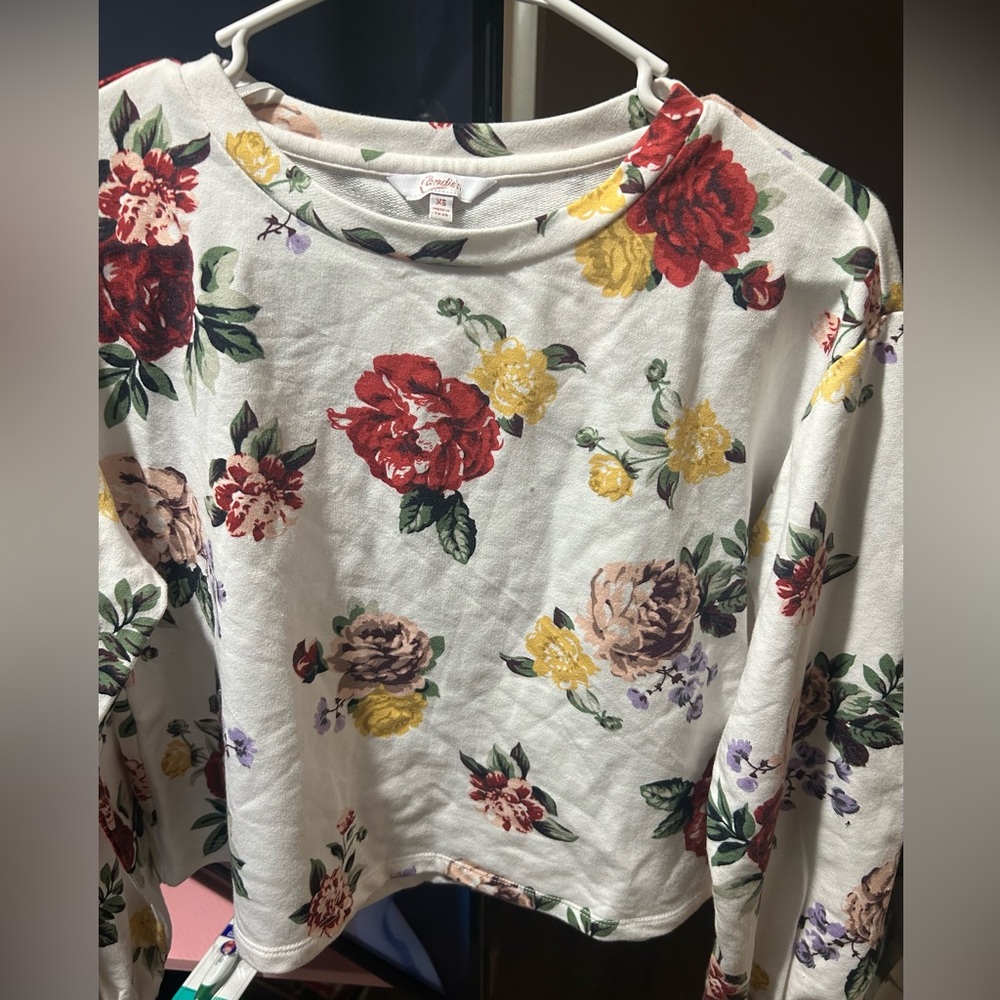 It’s a floral flower crop shirt
